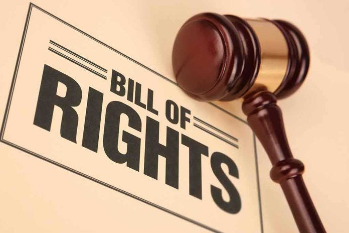 shutterstock_275726117 Gavel resting on a Bill of Rights document