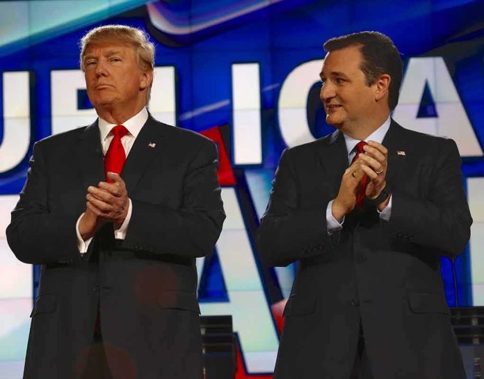 shutterstock_353116898 Donald Trump and Ted Cruz clapping on a debate stage