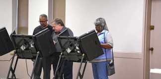AOC Lands on Newsweek’s SOCIALIST Cover Lester Bowie and Miriam Tlali using electronic voting machines at a polling place