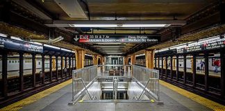 Commuters FLEE Deadly Subway Shooting Subway platform with stairwell and tracks on both sides