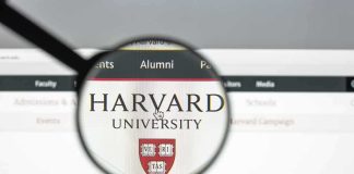 Harvard Liberals FIGHT Plan to Hire Conservatives Magnifying glass highlighting Harvard University website header