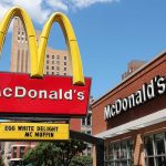 McDonald's signage with promotion outside restaurant.