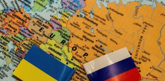 Map with Ukrainian and Russian flags.