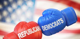 Red Republican and blue Democrat boxing gloves together