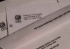 IRS letters and envelopes on a table.