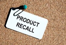 Product recall notice on a corkboard