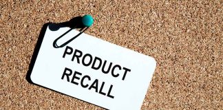 Product recall notice on a corkboard