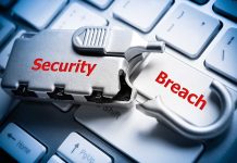Silver lock labeled Security on keyboard Breach key