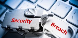 Silver lock labeled Security on keyboard Breach key