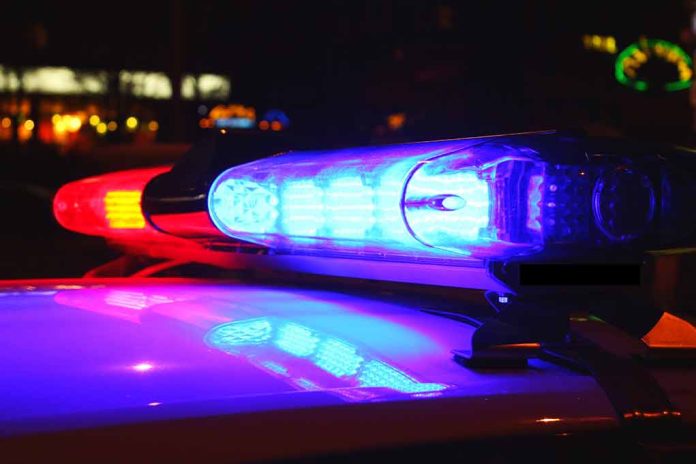 185887181 featured image Red and blue police car lights at night