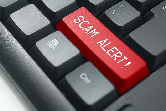 Closeup of keyboard with red SCAM ALERT key