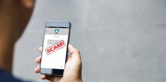 Person reading a scam message on a smartphone