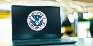 Laptop displaying U S Department of Homeland Security logo