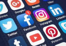 Social media app icons on a smartphone screen