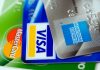 Credit cards stacked American Express Visa Mastercard