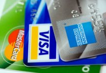 Credit cards stacked American Express Visa Mastercard