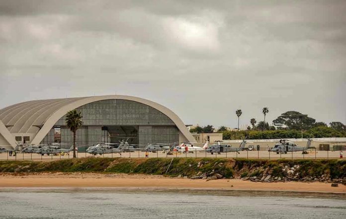 Aircraft hangar with helicopters near the beach