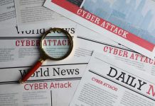 Newspapers with Cyber Attack headlines and a magnifying glass