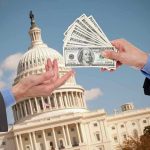 Hands exchanging money in front of Capitol building