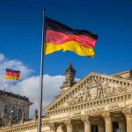 German flags at the Reichstag building in Berlin