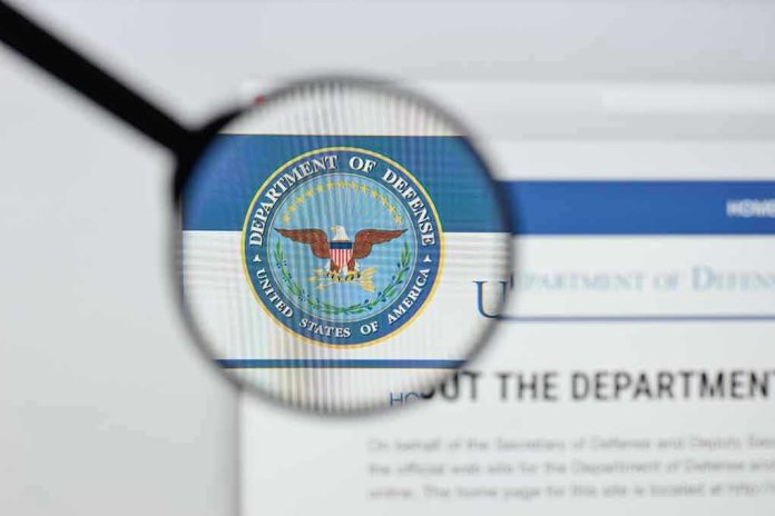 1168986508 Magnifying glass over Department of Defense logo.