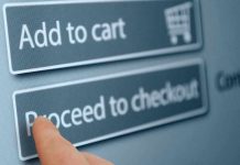 Finger tapping proceed to checkout button online