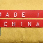 Red label reading 'MADE IN CHINA' on brown packaging