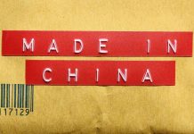 Red label reading 'MADE IN CHINA' on brown packaging