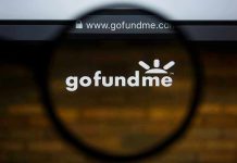 Magnifying glass over GoFundMe website logo