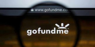 Magnifying glass over GoFundMe website logo