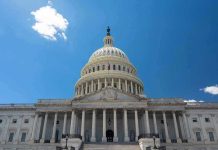 US Capitol building against a clear blue sky