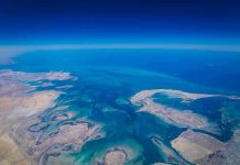 Aerial view of coastline and ocean
