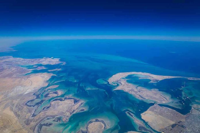 Aerial view of coastline and ocean