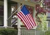 American flag hanging on a porch